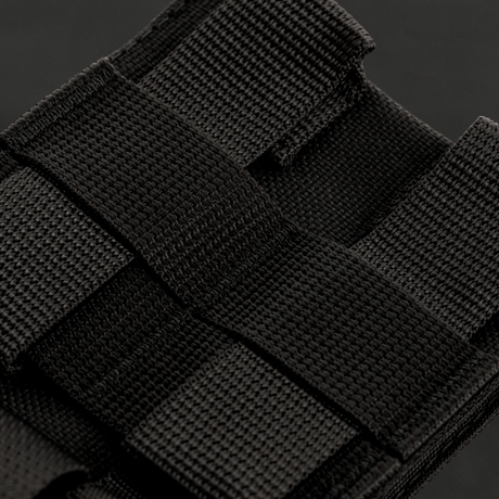 Närbild av M-Tac Mag Drop Pouch Elite med MOLLE-fästen för säker magasinförvaring och snabb tömning