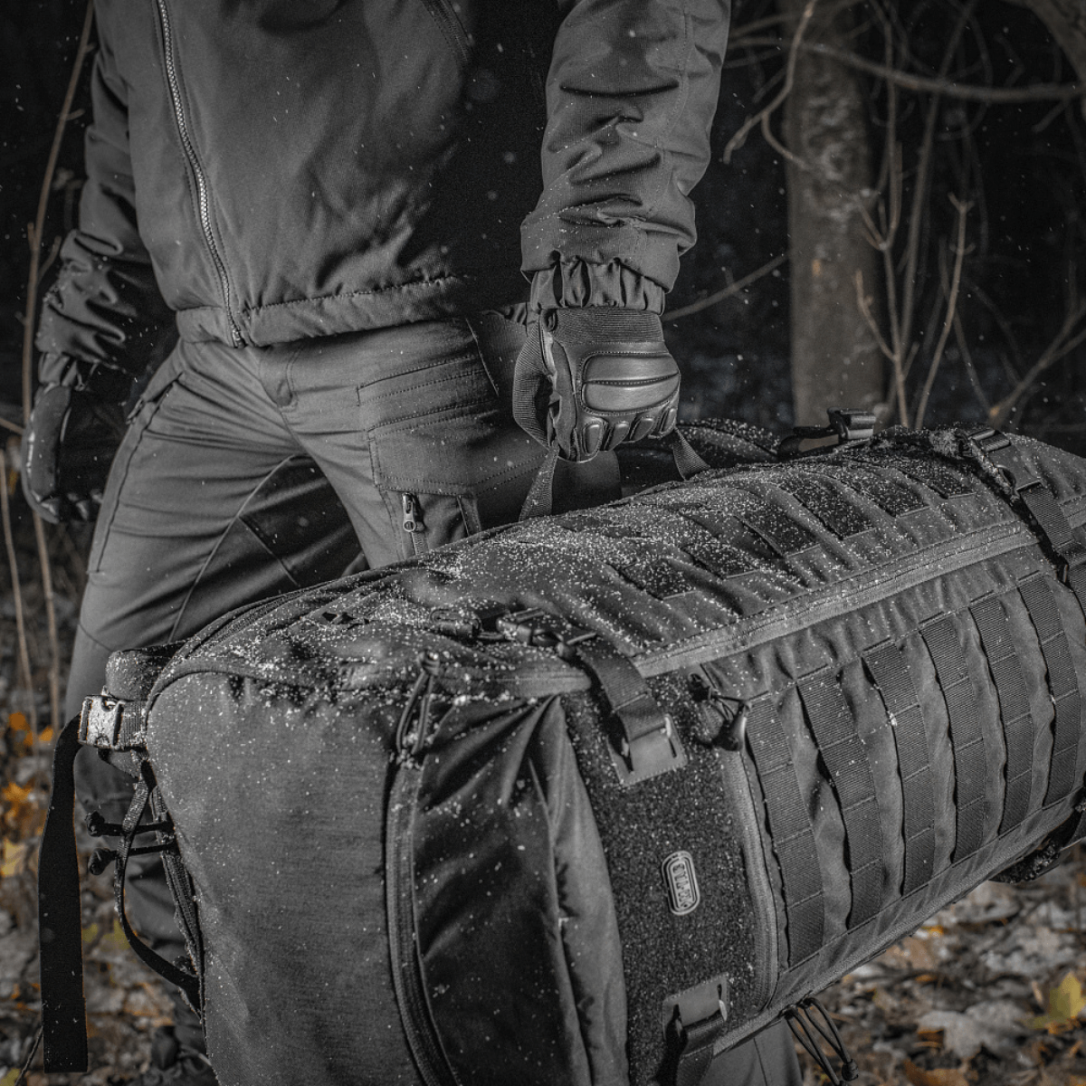 M-Tac Rygsæk Gen.II Elite Large bærer tasker til transport af våben, holdbarhed og stil i et funktionelt design.