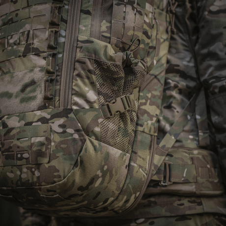 M-Tac Ryggsäck Large Gen.IV Elite i slitstarkt Cordura-material, kamouflagedesign, lämplig för daglig användning och transport av separerade vapen.