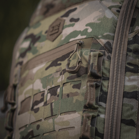 M-Tac Ryggsäck Large Gen.IV Elite i Cordura-material, kamouflagedesign, närbild av slitstarka och funktionella detaljer.