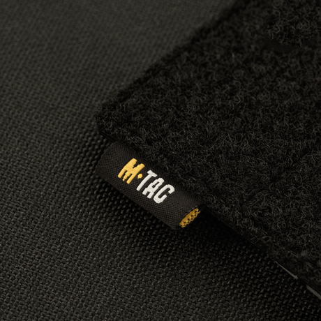 M-Tac Taktisk Morale Patch Display Board Hook og Loop Molle 120x85 med MOLLE-systemfäste och plastbas för patchar.