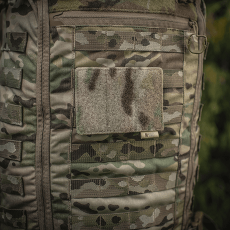 M-Tac panel för patches på MOLLE 120x85. MOLLE-fäste med hook & loop för patches och ID, plastbas för stabilitet. Mått: 120x85 mm.