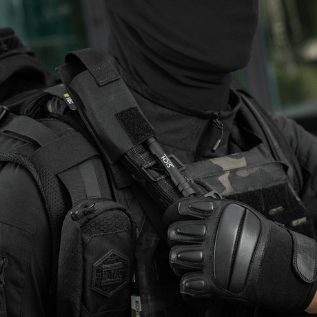 M-Tac Tourniquet Pouch Elastisk med MOLLE Gen.II på taktisk väst för snabb åtkomst till tourniquet, tillverkad i Cordura Squadron.