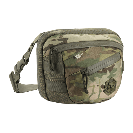 M-Tac Sphaera Hex Hardsling Taske Gen.II Elite i kamouflage med justerbar rem och två dragkedjefack. Kompakt och funktionell.