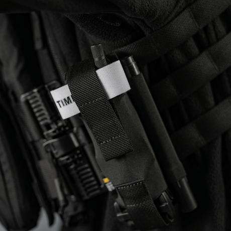 M-Tac Elastisk Tourniquet Pouch Molle Gen.III i svart Cordura med elastikdetaljer för säker fästning av C-A-T tourniquet.