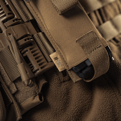 M-Tac elastisk tourniquetficka Molle Gen.III med Cordura-design och elastik för snabb åtkomst, märkt med M-Tac-logotyp, närbild.