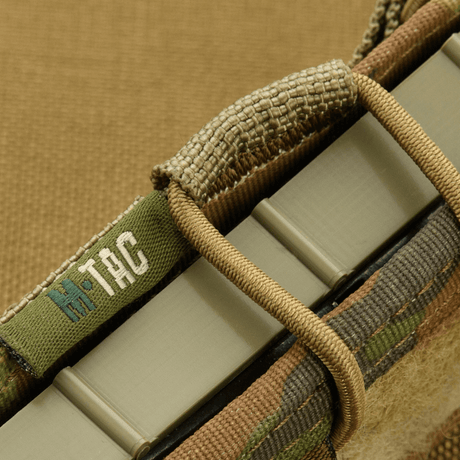 M-Tac Pistol Mag Pouch Gen.3 med justerbara plast-sidor och elastik, tillverkad av Cordura 500D, kompatibel med MOLLE-systemet.