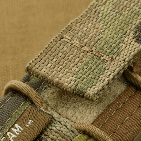M-Tac Pistol Mag Pouch Gen.3 tillverkad av Cordura 500D med MOLLE-system, visar detalj i camouflagemönster.