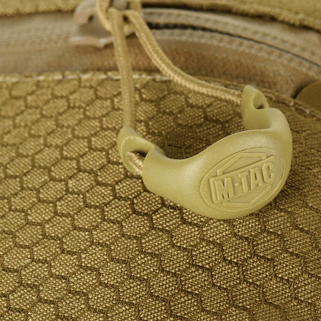 Närbild av M‑Tac Cross Bag Elite Hex med Cordura 500-material och YKK-dragkedjedetalj.