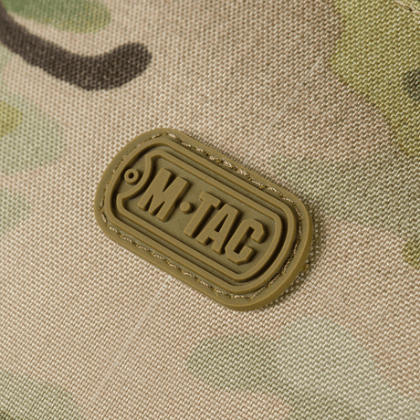 M‑Tac Cross Bag Elite Hex-logotyp på Cordura 500-material, designad för vardagsbruk och taktisk utrustning.