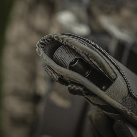 M-Tac universal taktiskt hölster Elite Vänster i laminerad Cordura 500D med NIJ-certifiering, justerbar storlek, galleri position 1.