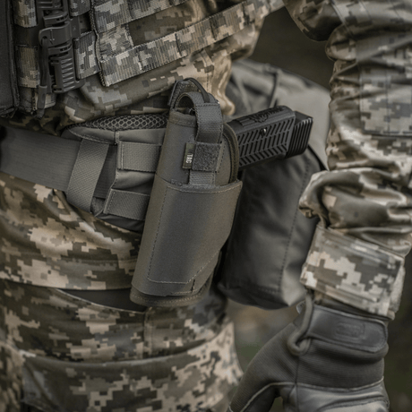 M-Tac universal taktiskt hölster Elite Vänster i laminerad Cordura 500D med NIJ-certifiering, justerbar passform, galleri position 1.