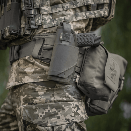 M-Tac universal taktiskt hölster Elite Vänster i laminerad Cordura 500D med NIJ-certifiering, justerbar passform, galleri position 1.