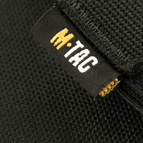 M‑Tac Front Panel för Cuirass QRS med M‑Tac-logga och svart Cordura 500D-tygdetalj, idealisk för militärt bruk och extra utrustning.