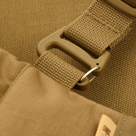 Närbild av M-Tac Taktisk Handvärmare Elite som visar slitstarkt Cordura 500D-material och spännedetalj.