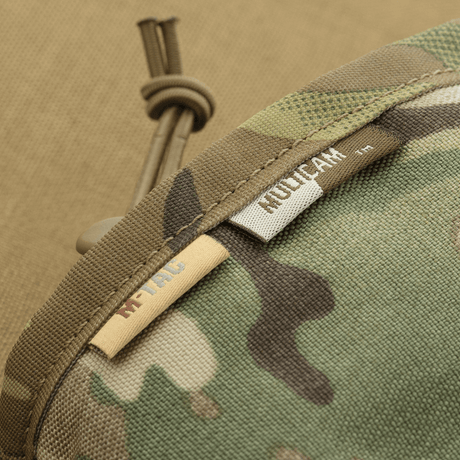 M-Tac Taktisk Handvärmare Elite med slitstarkt Cordura 500D-material och mjuk mesh-baksida för komfort och ventilation.
