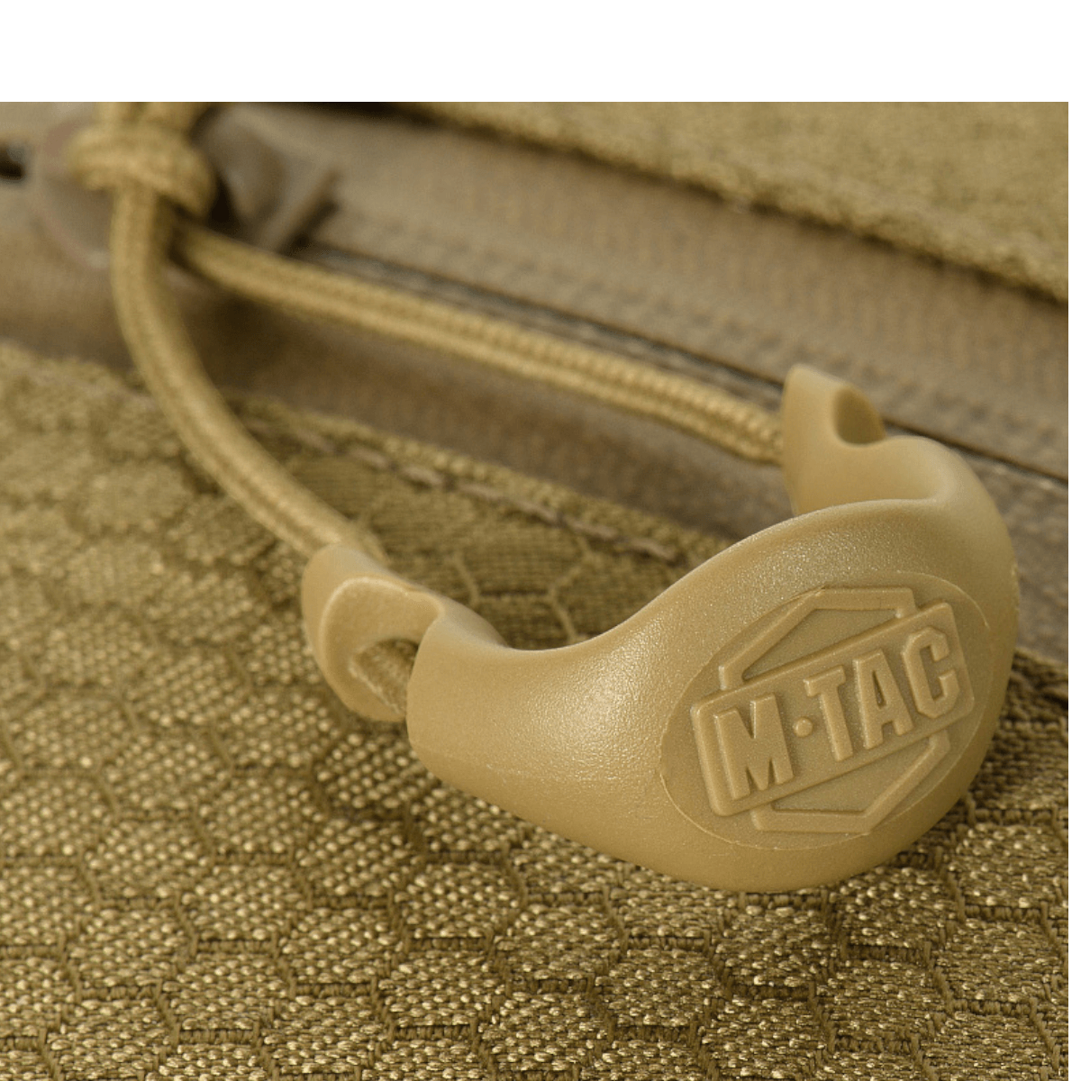 Nærbillede af M-Tac Sling Pistoltaske Elite Hex med slidstærkt Cordura stof og YKK lynlås. Perfekt til transport af skjult våben.