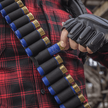 M-Tac Bandolier Elite för jakt med patroner, designad för snabb åtkomst, kapacitet 55 patroner, ergonomisk och hållbar konstruktion.