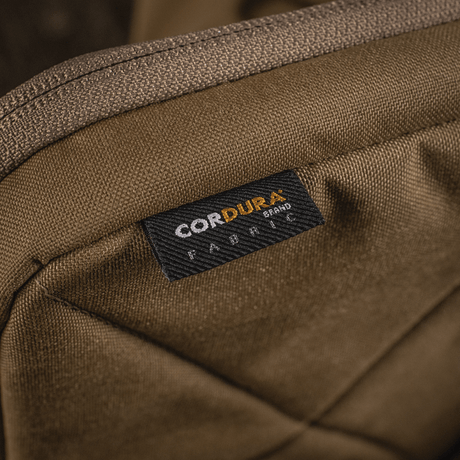 M-Tac Utility Organizer Slim Elite i Cordura 500D materiale, viser nærbillede af slidstærkt stof til sikker opbevaring og organisation.