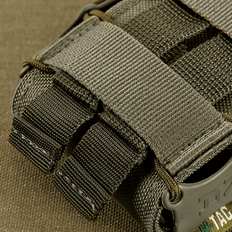M‑Tac Mag Pouch Kolchan för AK/AR med MOLLE-monteringssystem, tillverkad i slitstarkt Cordura 1000D-material för säker magasinförvaring.