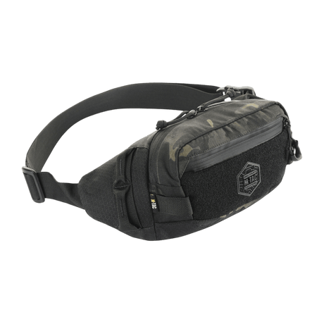 M‑Tac bältesväska Elite Hex i Cordura med stilren design och YKK-dragkedjor, perfekt för vardagsanvändning. Har två fack och velcro-panel.