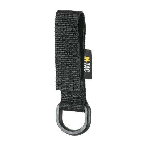 M-Tac fäste med D-ring för montering på MOLLE-utrustning, med Velcro-stängning och kompakt design för taktisk användning.