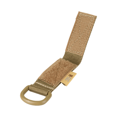 M-Tac fäste med D-ring för MOLLE-system, kompakt och lätt för taktisk användning med Velcro-stängning för säker montering.