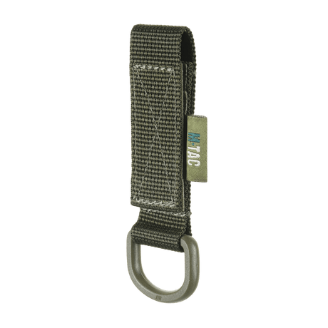 M-Tac fäste med D-ring för MOLLE-system, idealisk för taktisk användning med Velcro-låsning och kompakt design.