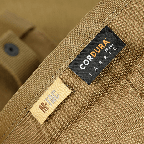 Närbild av M‑Tac magasinpåse Dump Pouch Lite Elite i Cordura 500D-tyg med synliga sömmar som framhäver hållbarhet och kraftigt material.