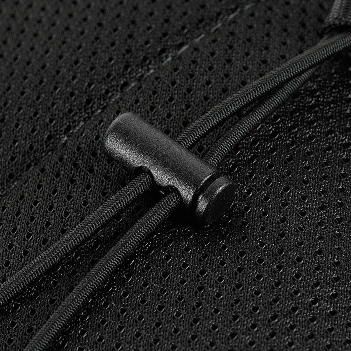 Detalje af M‑Tac Pocket Bag Elite HEX med robuste YKK lynlåse, velegnet til opbevaring af småting.