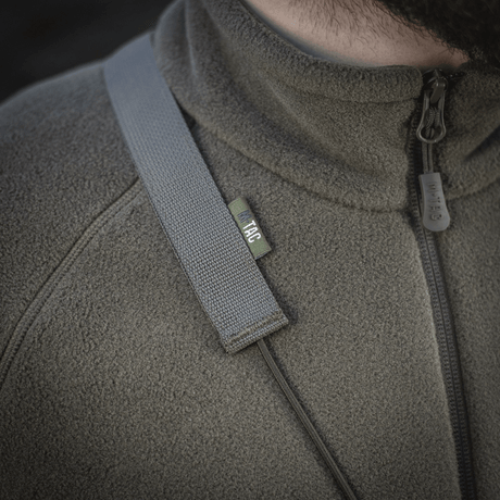 M‑Tac Pocket Bag Elite HEX bærestrop på slidstærk YKK lynlås fleecejakke, ideel til EDC-udstyr og hverdagens brug.