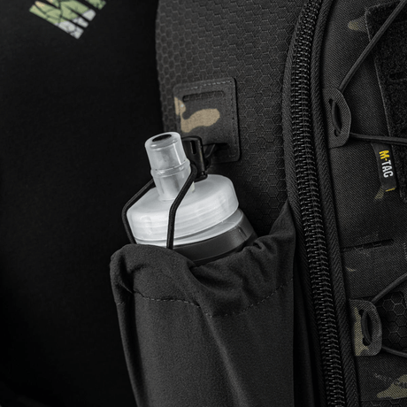 M-Tac STURM Elite Rygsæk med elastisk sidelomme og vandflaske, designet til taktisk brug.