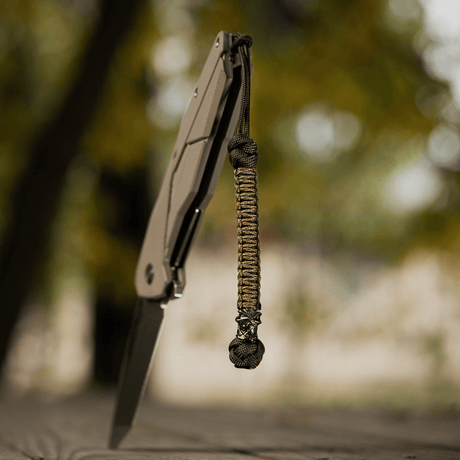 M-Tac Knife Lanyard Ninja i flätad paracord med unik stil, snabb åtkomst till kniv, längd 14,5 cm, perfekt för friluftsliv