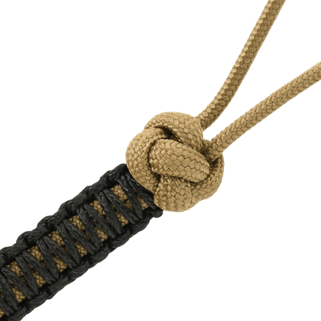 Närbild av M-Tac Knife Lanyard Ninja i paracord med en knut, stilfullt och praktiskt knivtillbehör