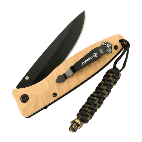M-Tac Knife Lanyard Helix Skull flätad paracord-lanyard med kniv och dödskallehängsmycke.