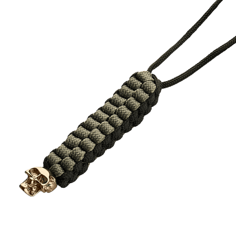 M-Tac Knife Lanyard Cuboid Skull i flätad paracord med dekorativ Cuboid Skull-pärla. Stilfullt och praktiskt tillbehör för knivar.