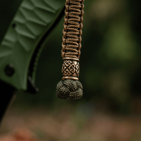 M-Tac Knife Lanyard Celtic i flätad paracord med dekorativ design, tillbehör till knivar och utrustning.