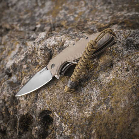 M-Tac Viper Lanyard Stainless Steel med flätad paracord och rostfri Viper-pärla på knivhandtag, perfekt för snabb åtkomst.