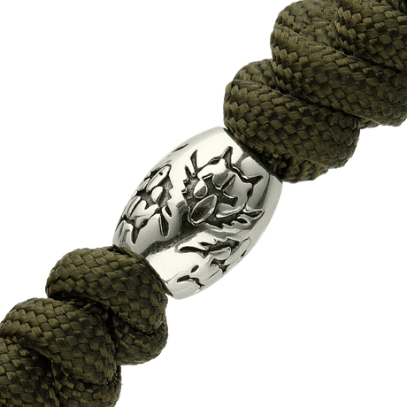 Flätad M-Tac Zeus Stainless Steel Lanyard med dekorativ pärla i rostfritt stål för kniv och utrustning, ger snabb åtkomst och funktionalitet.