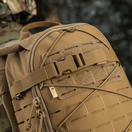 M-Tac Rygsäck Sturm Elite Gen.II med elastisk snörning och MOLLE-system för extra utrustning, lämplig för fältöverlevnad.