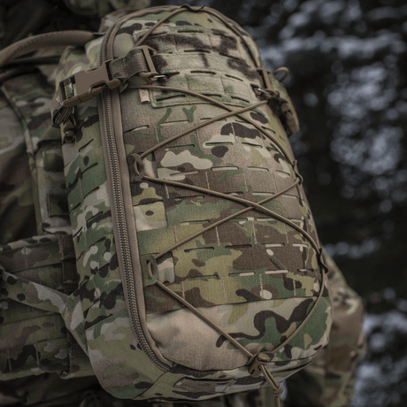 M-Tac Rygsäck Sturm Elite Gen.II i camo med MOLLE Laser Cut-system, Cordura-tyg för fältresor, sedd utifrån.