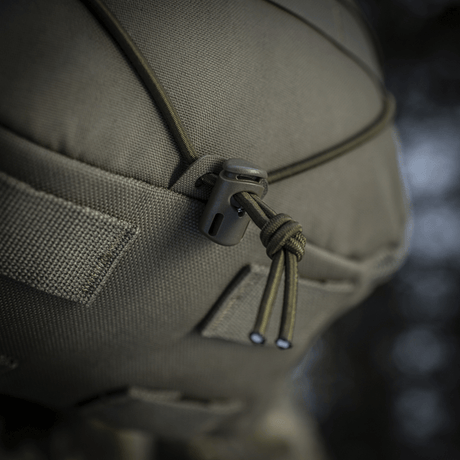 Närbild av M-Tac Ryggsäck Sturm Elite Gen.II med elastisk snörning och hållbart Cordura-material för fältbruk.