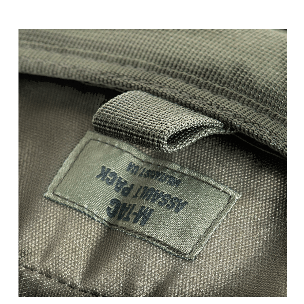 Etiketten på M-Tac Large Assault Pack Rygsæk Laser Cut viser detaljerne i den robuste design.