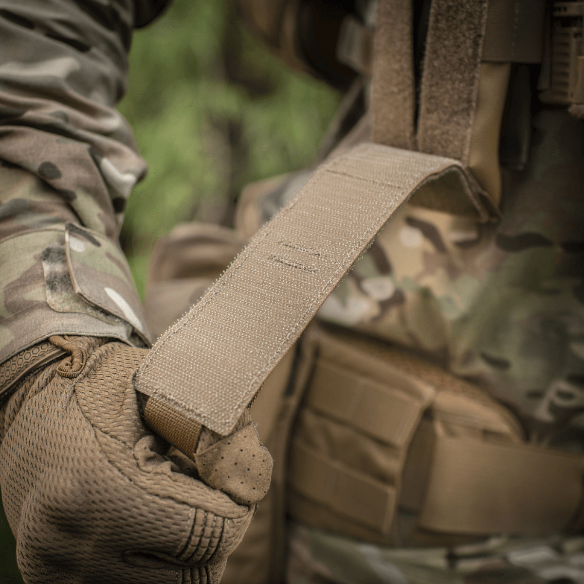 M-Tac Lomme til Tourniquet Closed sikrer pålidelig beskyttelse af førstehjælpsgrej med camouflage design og robust konstruktion.