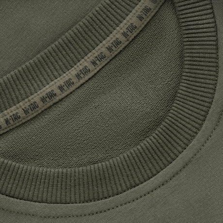 M-Tac Pullover 4 Seasons i olivgrön med rund hals och stretchmuddar för användning året runt.