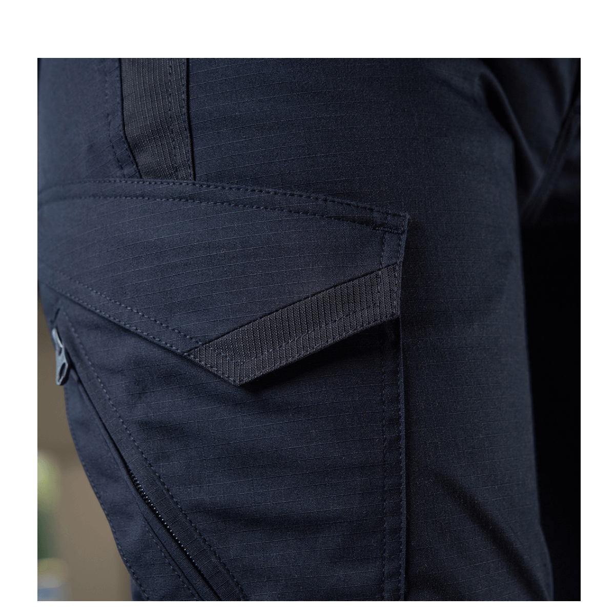 Nærbillede af M-Tac Bukser Aggressor Dame Flex med Teflon-impregnering til vandafvisning og snavsbeskyttelse.