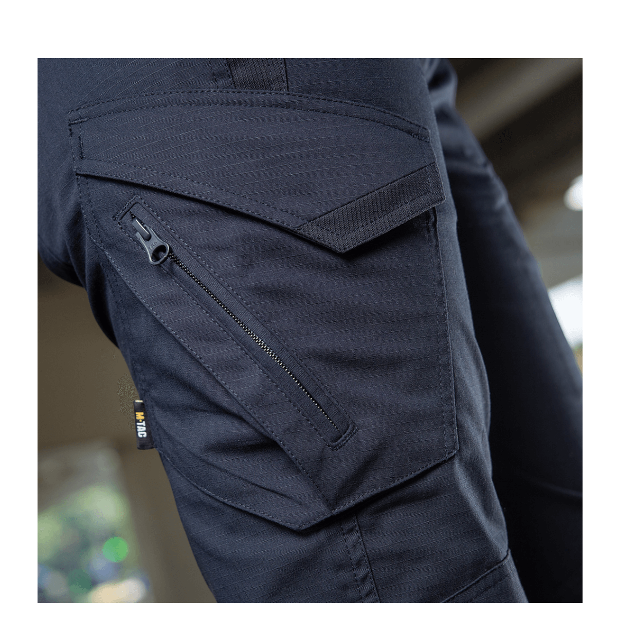 M-Tac Bukser Aggressor Dame Flex med Teflon-beskyttelse, ideel til træning og rejser, zoom på lomme detalje.