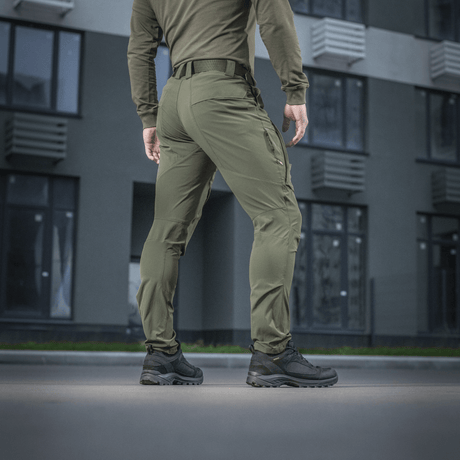 M-Tac Bukser Rubicon Flex i 4-Way Stretch stof, set bagfra, optimal til træning, skydning, og fritid, med innovativ cargo-lomme design.