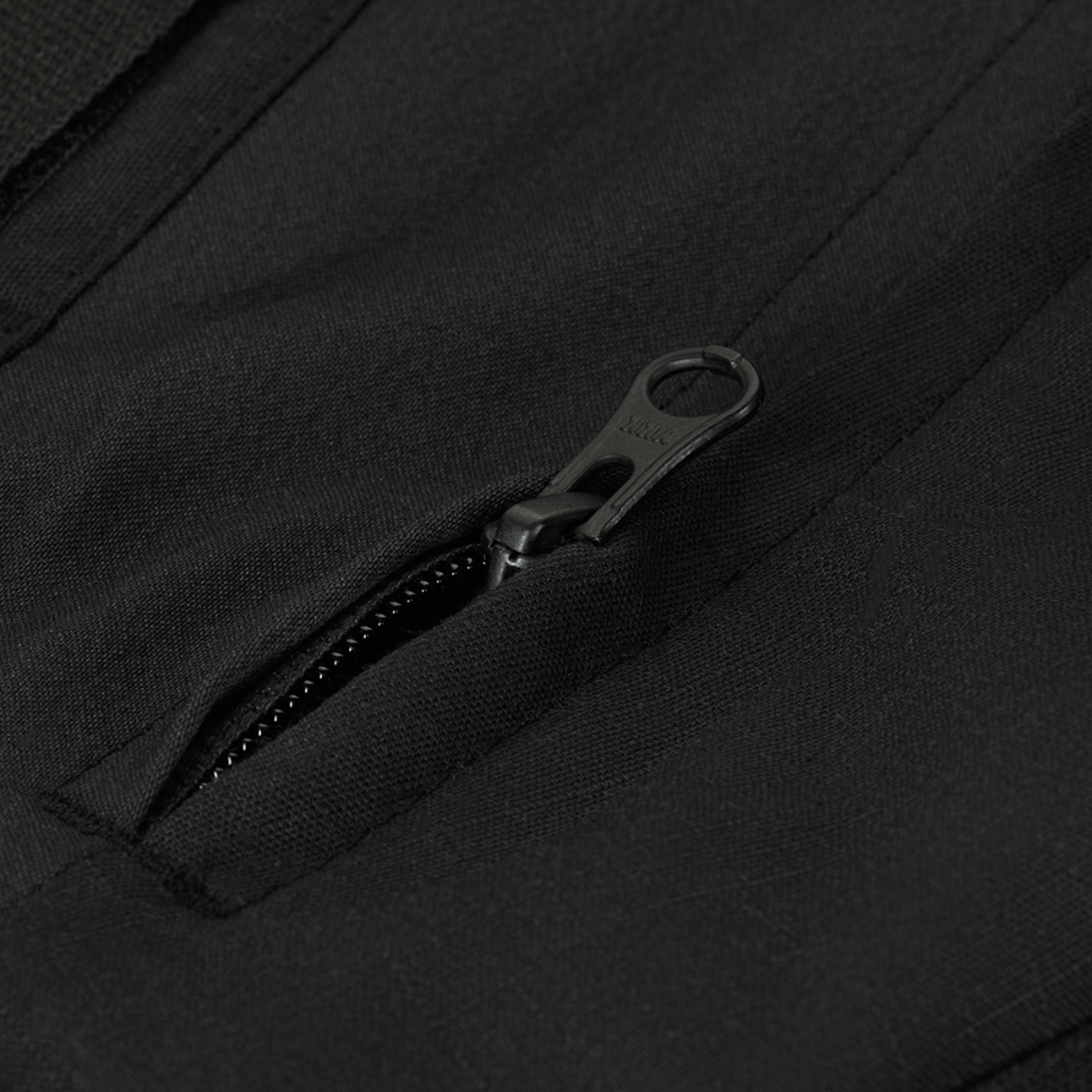 Lynlås detalje på M-Tac Bukser STURM NyCo Extreme Gen.II, designet til komfort og holdbarhed med NYCO Extreme materiale.