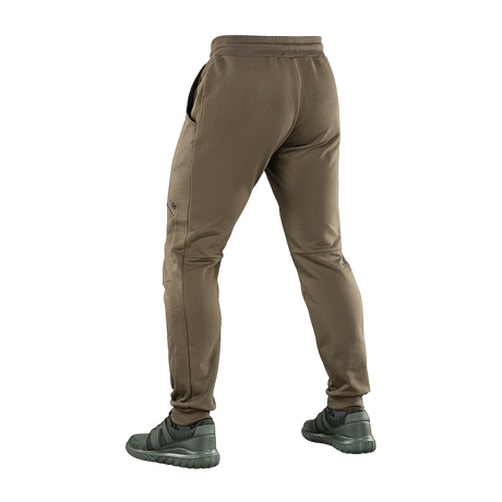 M-Tac Bukser Stealth Cotton, brune bomuldsbukser, bagfra, med elastik i taljen og sidelommer, i en sportslig stil for bevægelsesfrihed.